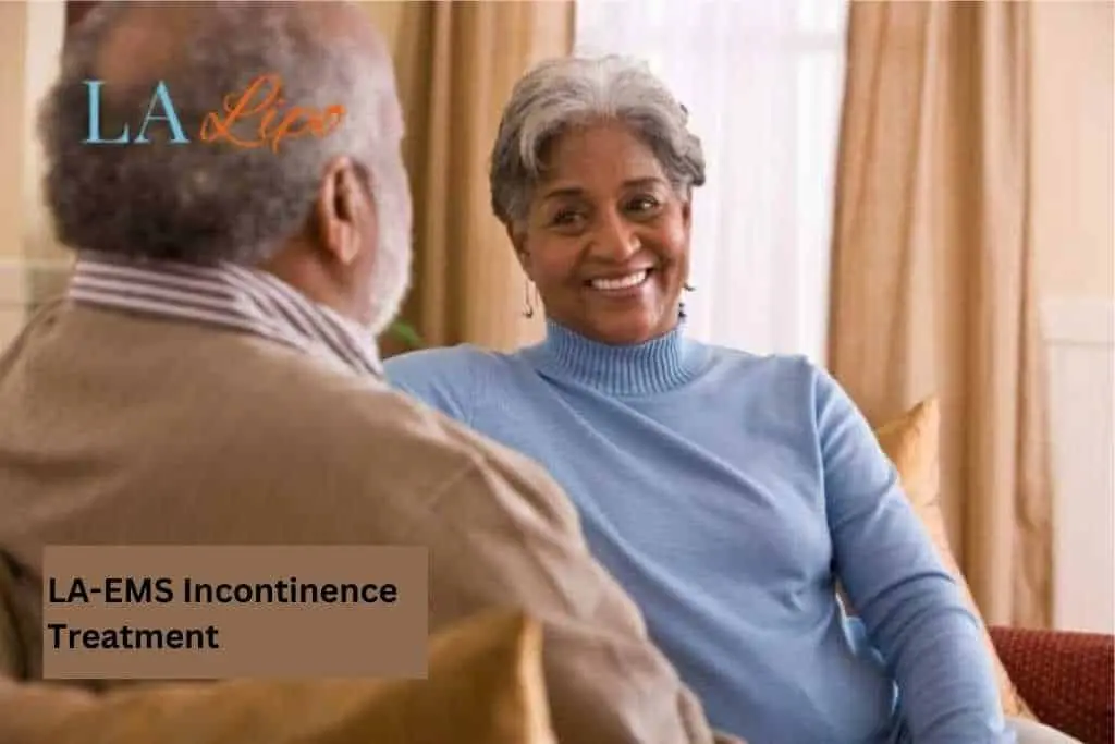 Couple sat smiling at each other - LA-EMS treatment Kingsbury