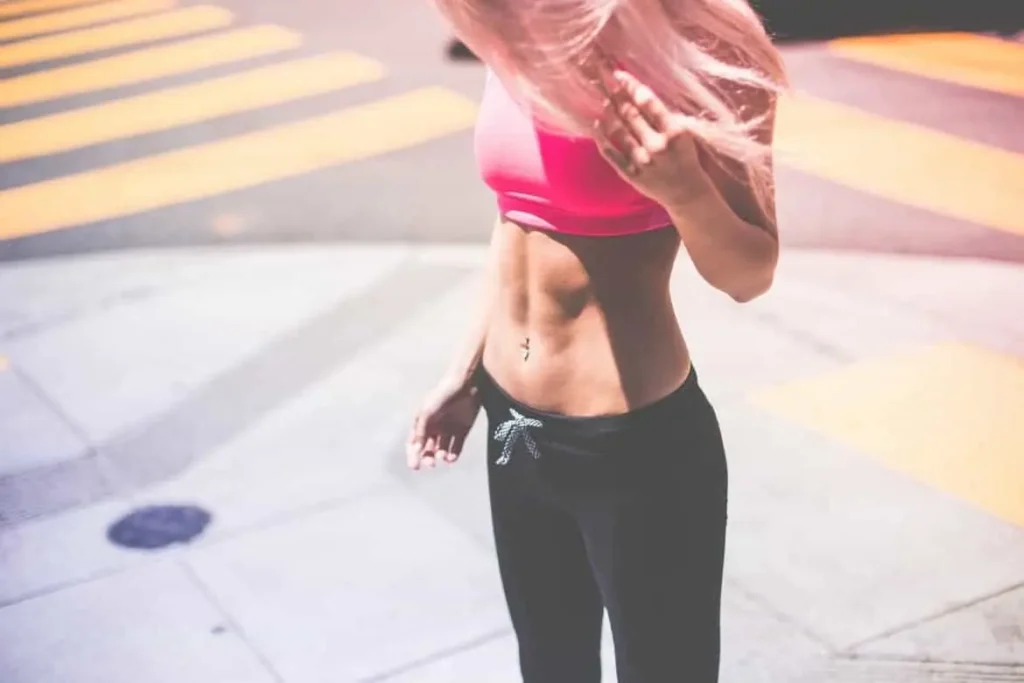 Woman with toned stomach after LA-EMS Body Sculpting Treatment Kingsbury